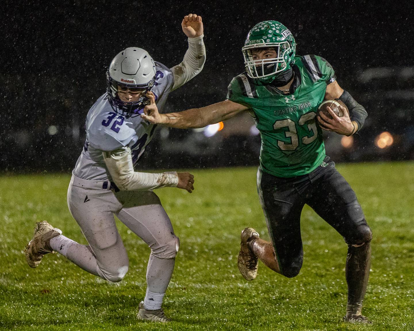 Cam Shriey (33) of Seneca runs ball whilst pushing away Dierks Geiss (32) of Wilmington on Saturday, November 8, 2025 at Seneca High School in Seneca.