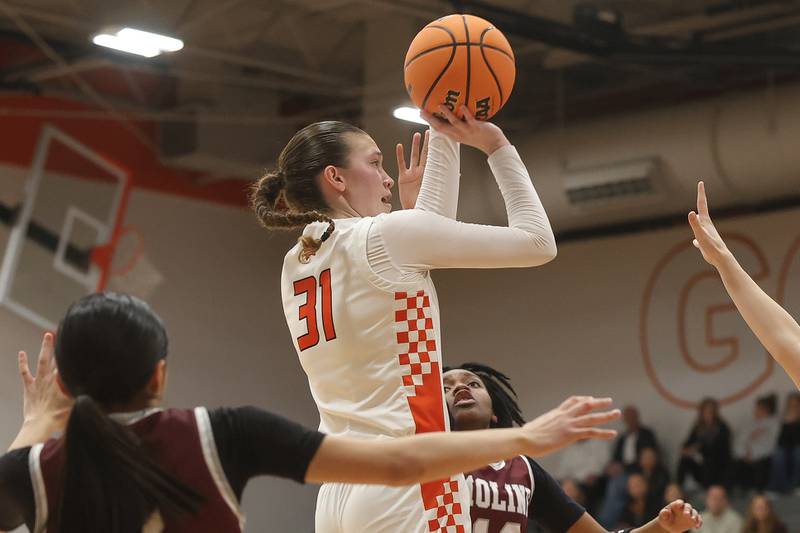 Minooka’s Madelyn Kiper takes a mid-shot against Moline in the Class 4A Minooka Regional championship game on Thursday, Feb. 19, 2026 in Minooka.