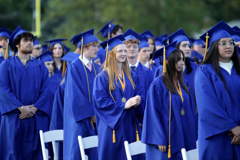 Lyons Township High School graduates line up on Bennett Field for the school’s 2023 commencement ceremony in Western Springs on Wednesday, May 31, 2023.