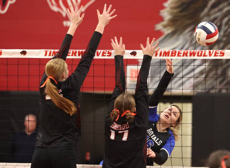 Hinckley-Big Rock's Grace Barrett spikes the ball by Indian Creek's Cheyenne Buh during their Class 1A regional play-in game Monday, Oct. 28, 2024, at Indian Creek High School in Shabbona.