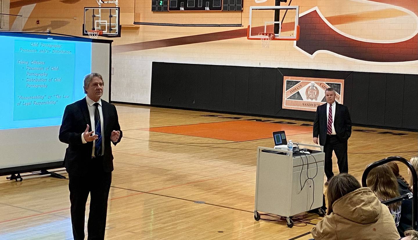 DeKalb County Chief Judge Bradley Waller (left) and Kane County Chief Judge Clint Hull present "Worries of the World Wide Web," an educational look at social media and digital messaging, what's safe and what's legal, to freshmen at Sandwich High School, 515 Lions Road, Sandwich, on Nov. 29, 2023. The program aims to educate youth on the dangers of social media, electronic harassment and sexting, and how to ensure an action today won't negatively impact their future.