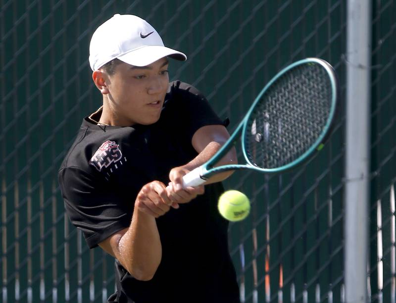 Huntley’s Will Geske returns the ball as he competes in the Class 2A Boys State Tennis Tournament on Thursday, May 23, 2024, at Hersey High School in Arlington Heights.