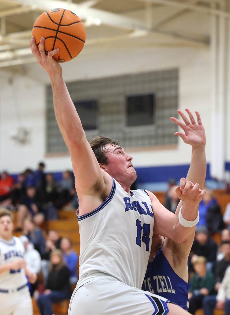 Hinckley-Big Rock's Martin Ledbetter goes to the basket against a Rochelle Zell defender during their game Tuesday, Dec. 17, 2024, at Hinckley-Big Rock High School.