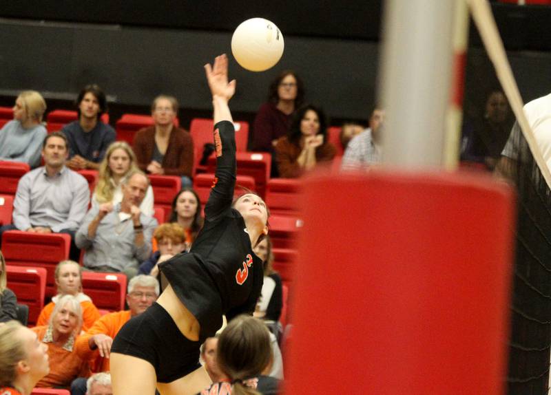 St. Charles East’s Kate Goudreau goes up for a kill during a Class 4A Proviso West Sectional final against Willowbrook on Wednesday, Nov. 2, 2022.