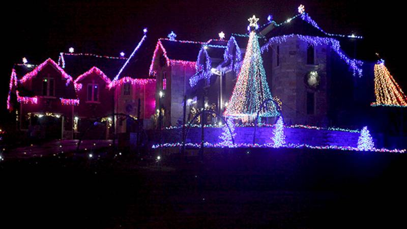 The lights on Brian Larsen's Campton Hills home dance to the beat of the holiday music. The Larsen Light Show won its segment of ABC-TV's "The Great Christmas Light Fight," which aired Monday night. The winning prize was $50,000.