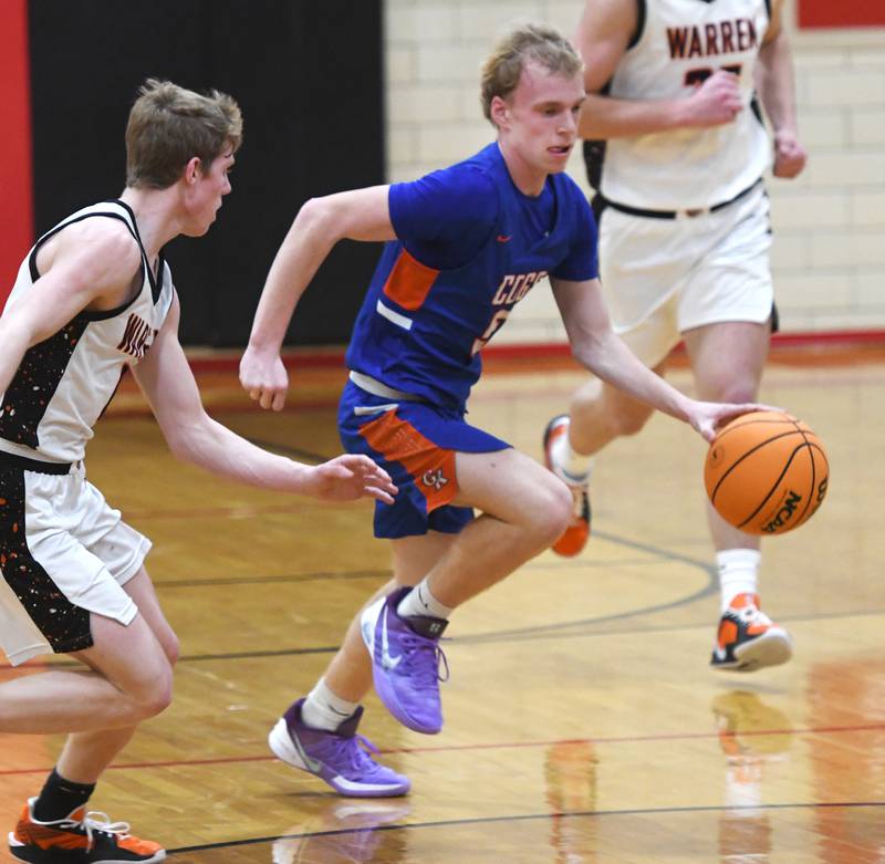 Genoa-Kingston's Blake Ides (5) leads the fast break against Warren at the 64th Annual Forreston Holiday Basketball Tournament held at Forreston High School on Saturday, Dec. 13, 2025.