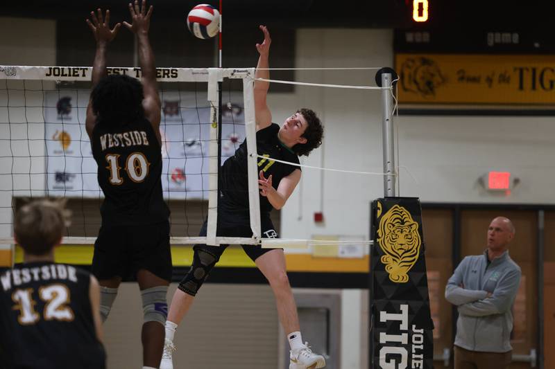 Providence’s Adam DeRubertis hits a shot against Joliet West on Thursday, March 23, 2023 in Joliet.