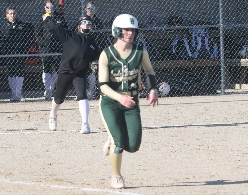 Woodland/Flanagan-Cornell's Emma Palaschak throws out St. Bede's Emma Slingsby at first base on Tuesday, April 8, 2025 at Woodland High School.