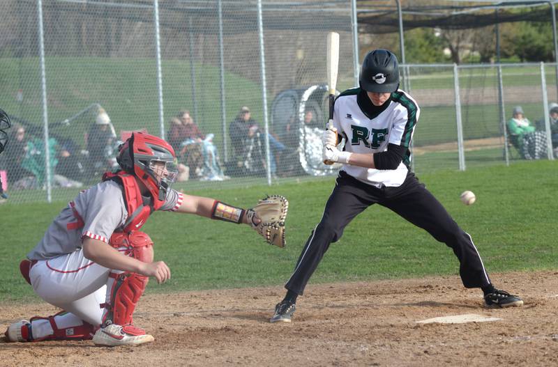 Oregon's Kade Girton prepares to catch a pitch as Rock Falls' Owen Laws bats during a Monday, April 21, 2025 game at Oregon High School.