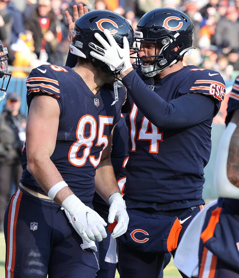 Chicago Bears tight end Cole Kmet and quarterback Nathan Peterman celebrate their touchdown hookup Sunday, Jan. 8, 2023, during their game against the Minnesota Vikings at Soldier Field in Chicago.