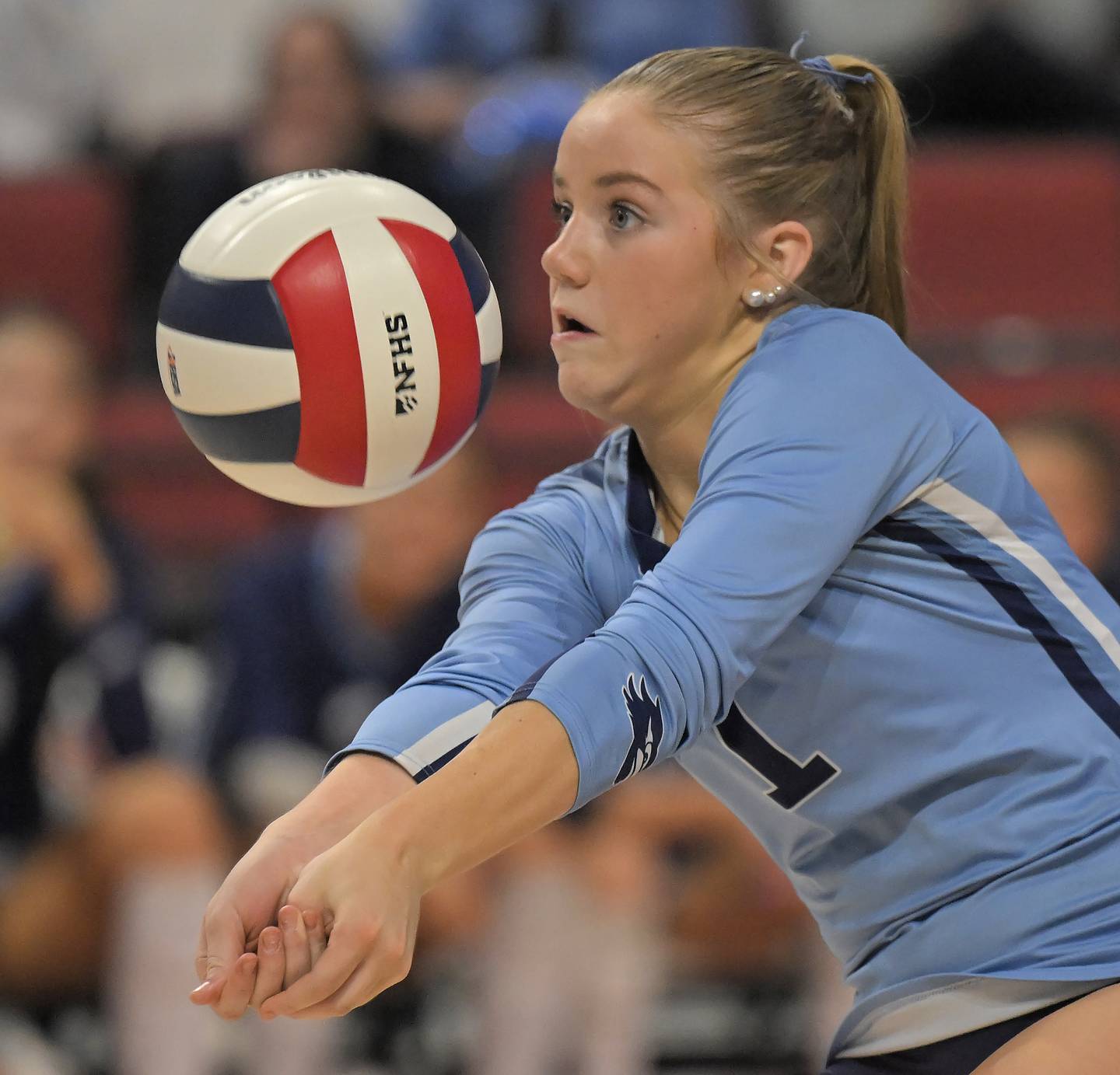 Nazareth’s Tess Tortorello digs a Normal U-High shot in the Class 3A final match at the IHSA girls volleyball state finals tournament on at Illinois State University on Saturday, Nov. 15, 2025