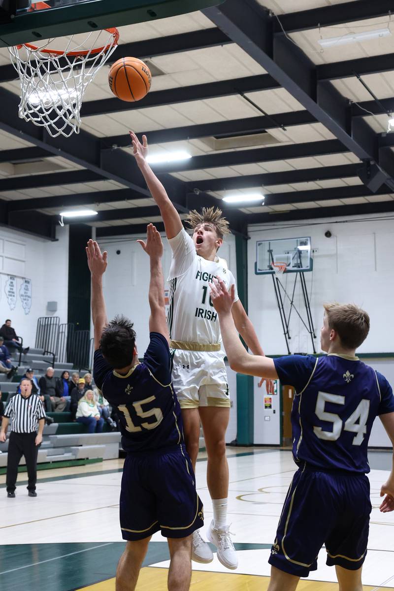Bishop McNamara's Coen Demack tosses in a shot during the Fightin' Irish's 62-25 victory over Chesterton Academy on Wednesday, Jan. 7, 2026.