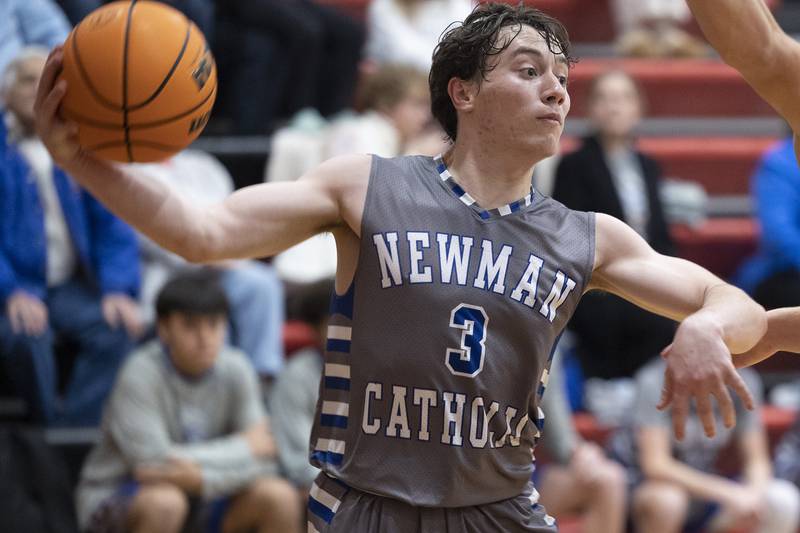 Newman’s Garret Matznick makes a pass against Byron Friday, Dec. 19, 2025, in the Forreston Holiday Tournament title game.
