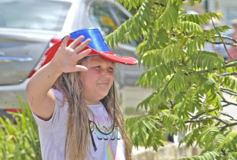Hadley Heck of Oregon waves to the crowd during the Dixon Petunia Fest parade on Sunday,  July 6, 2025.