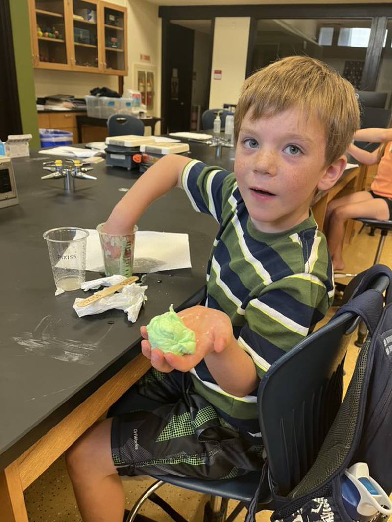 A future chemist creates a “bouncy ball" during Carus science camp.