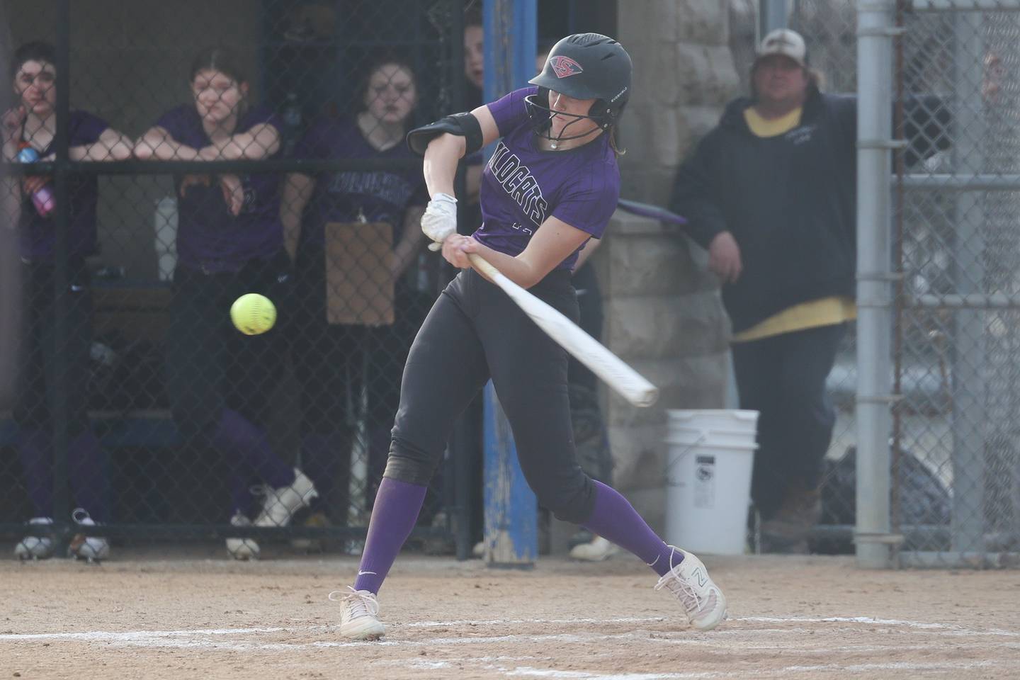 Wilmington’s Molly Southall drives in a run against Joliet Central on Tuesday, March 12 in Joliet.