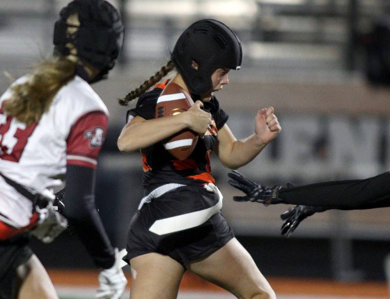 McHenry’s Avery Stinger runs the ball against Antioch in IHSA Regional Title Game action flag football at McHenry High School in McHenry on Thursday, Oct. 10, 2024.