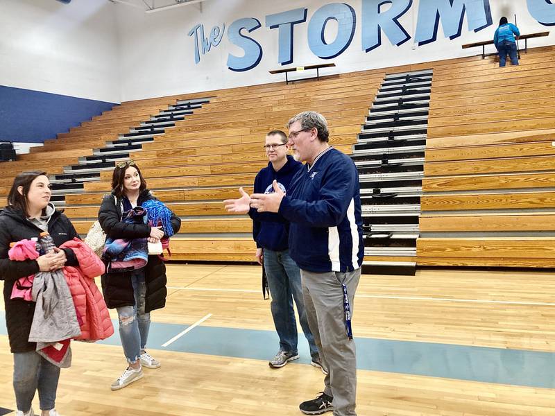 Brad Bickett speaks to friends at the Storm Cellar Saturday evening. The former Storm basketball coach, who is retiring at the end of the school year as athletic director/dean of students, was recognized for all of his contributions to Storm basketball.