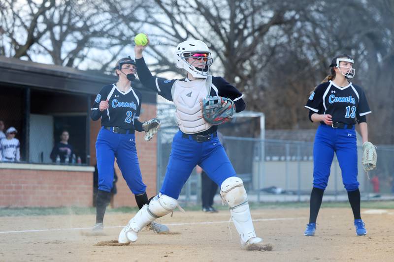 Central catcher Lia Prairie throws to first after fielding a bunt during the Comets' 22-5 loss to Wilmington on Wednesday, March 26, 2025.