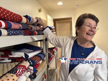Payment accepted in hugs: Huntley group honors veterans with handmade quilts