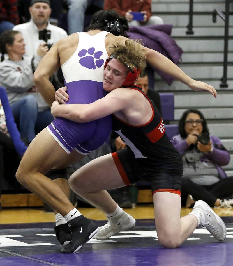 Huntley's Dylan Cerny tries to take down Hampshire's Uriah Beamon during the 190-pound match of a Fox Valley Conference wrestling meet on Wednesday, Jan. 8, 2025, at Hampshire High School.