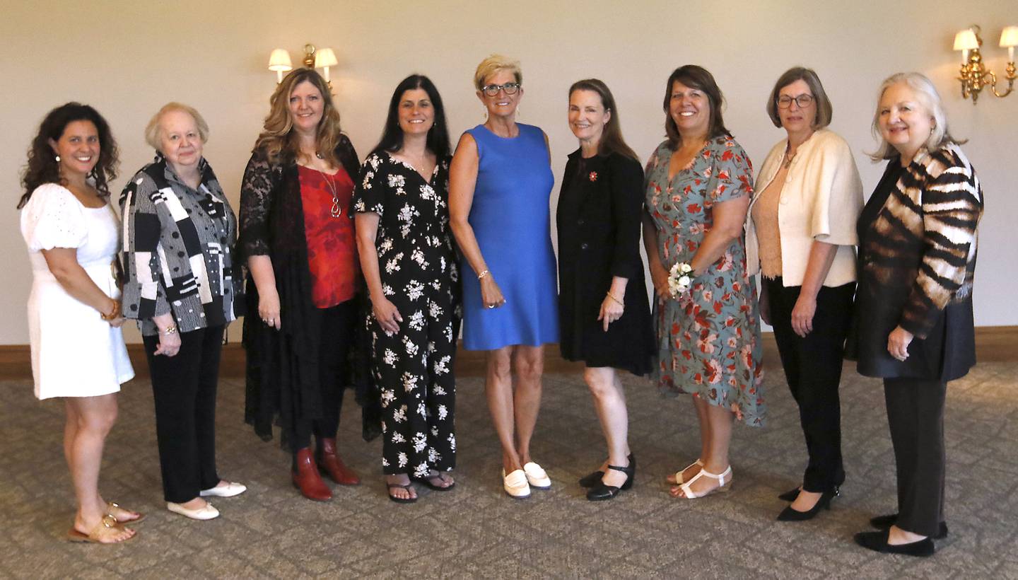 Award recipients (from left to right) Denise Smith, Melissa Cooney, Cassandra Vohs-Demann, Kristin Schmidt, Donna Rasmussen, Laura Franz, Lynn Caccavallo, Catherine Jones, and Kathleen Narcosis during the Northwest Herald's Women of Distinction award luncheon Wednesday June 4, 2025, at Boulder Ridge Country Club, in Lake in the Hills. The luncheon recognized ten women in the community as Women of Distinction. Award recipient Elizabeth Rios was not at the event.