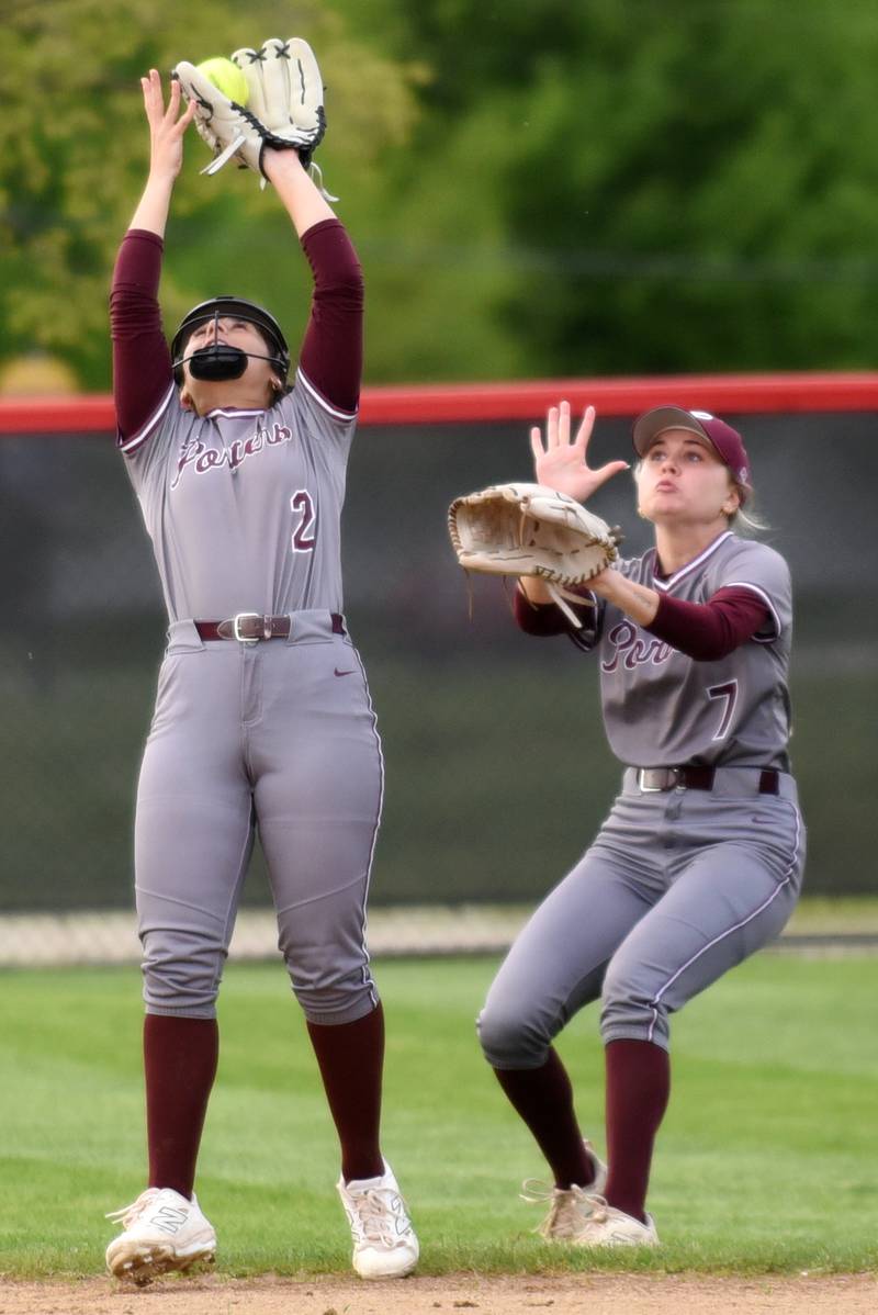 Lockport's Giavanna DiCicolla, left, catches a pop up in front of Noelle Sustersic during a game at Bradley-Bourbonnais Tuesday, April 28, 2026.