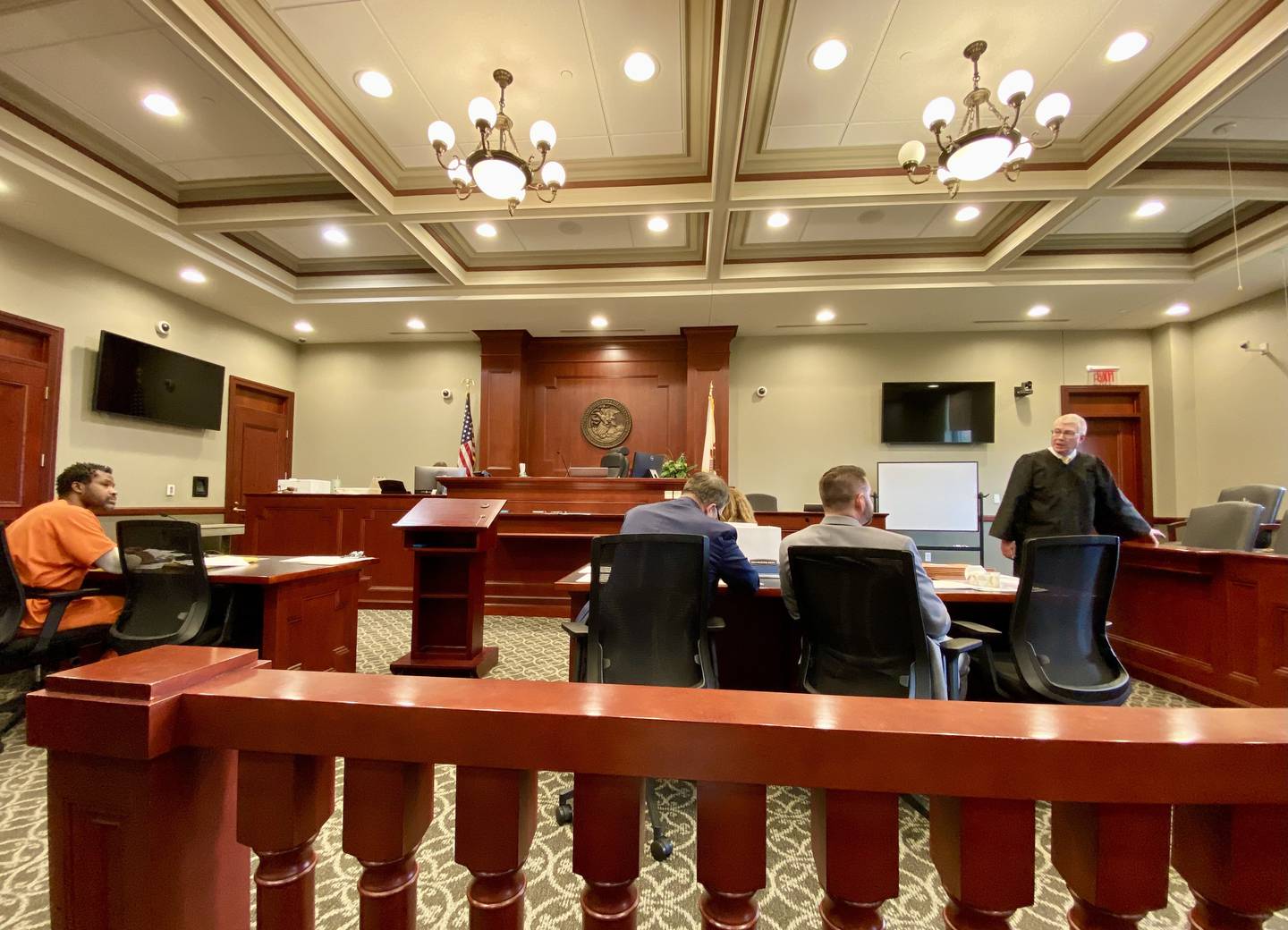 Matthew L. Martin (left) listens as DeKalb County Circuit Court Judge Philip Montgomery explains how jury selection will work in a pretrial hearing on Wednesday, April 2, 2025, at the DeKalb County Courthouse in Sycamore. Martin, 44, of Chicago, is charged in a July 2024 DeKalb bank robbery and is expected to represent himself at trial beginning April 7.