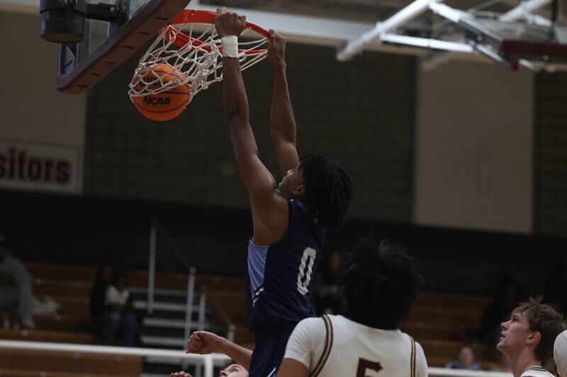 Plainfield South’s Karrem Parker throws down a dunk against Morris on Wednesday, Jan 29, 2025 in Morris.