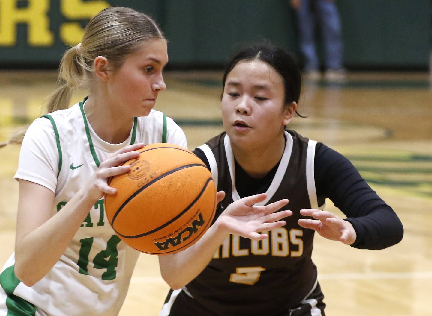 Crystal Lake South's Makena Cleary drives into the lane against Jacobs' Sophia Acot during a Fox Valley Conference basketball game on Friday, Jan. 17, 2025, at Crystal Lake South High School.