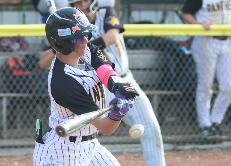 Putnam County's Carter Hochstatter makes contact with the ball on Friday, May 8, 2026 at Putnam County High School.