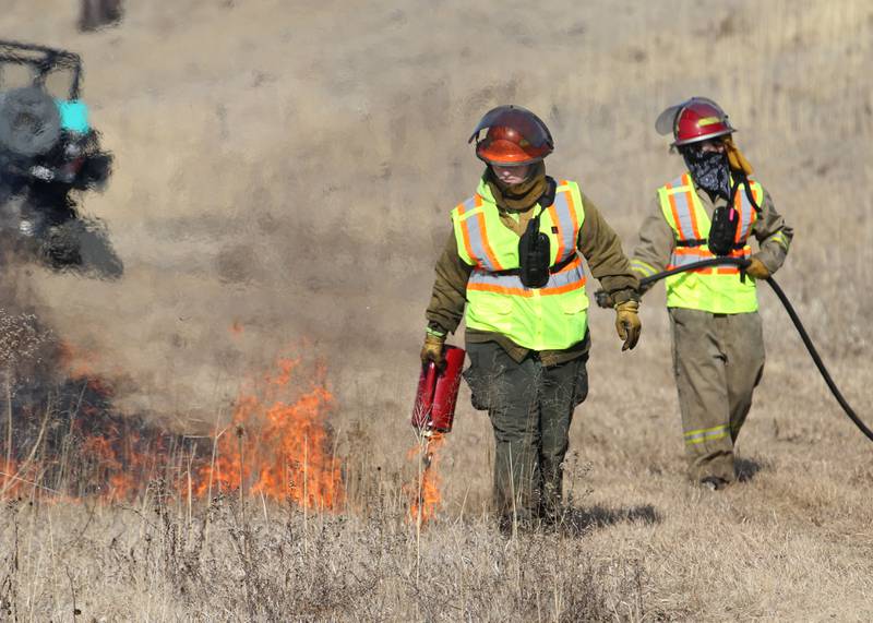 Crews from Semper FI Land Services. along with the help from the Illinois Department of Transportation, conduct a controlled burn at Deer Pit Prairie near the intersection of Interstate 39 and Illinois Route 251 on Monday, Feb. 10, 2025 near Oglesby. The burns are designed to clear out invasive plants and encourage the growth of native prairie vegetation. Other locations that IDOT has another scheduled future burns are Indian Boundary Prairie near Ohio in Bureau County.