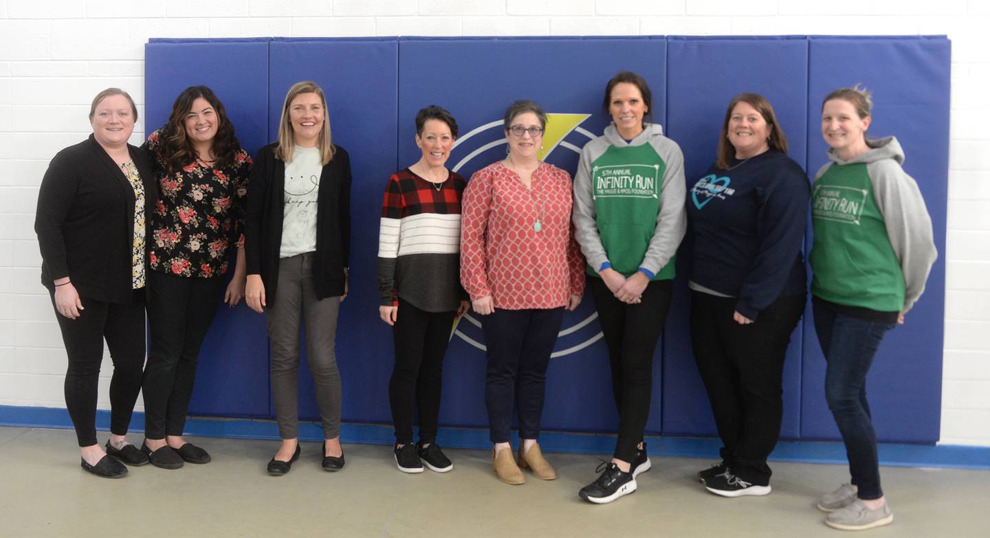 Chana Education center staff pose with three recipients of The Maggie & Amos Foundation educational grants on Thursday, Feb. 15, 2024. Pictured, left to right, are: Erin Karper, Therese Koch, Marie Tuten (Forrestville Valley School District), Amy Schwamberger (Amboy Elementary), Debra Cleary (Amboy High School), Lynn Kalnins, Stephane White, and Megan Dettman.