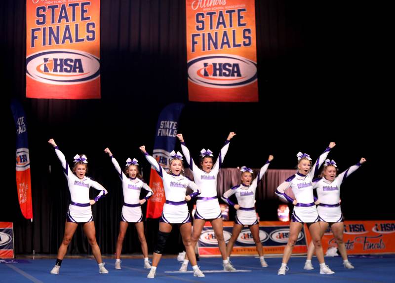 Members of the Wilmington cheerleading team compete in the small team division of the IHSA State Finals on Saturday, Feb. 8, 2025 at Grossinger Motors Arena in Bloomington.