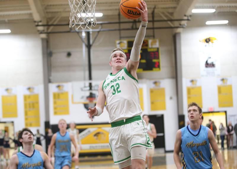 Seneca's Paxton Giertz scores on a breakaway against Marquette during the Tri-County Conference championship on Friday, Jan. 31, 2025 at Putnam County High School.