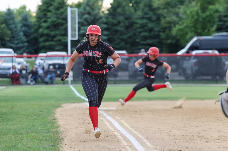 Bradley-Bourbonnais’ Leila Middlebrook nears home to score as Suttyn Hop rounds third behind her during the Boilermakers' 8-0 victory over Normal Community in the IHSA Class 4A Bradley-Bourbonnais Regional semifinal on Tuesday, May, 27, 2025.
