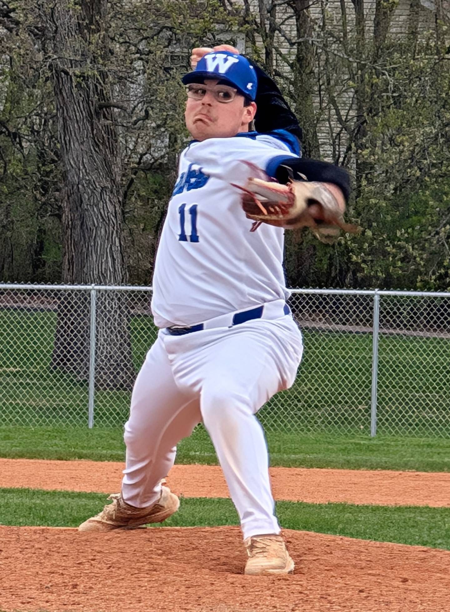 Maximilian Haggerty delivers a pitch against Johnsburg on Wednesday, April 30, 2025, at Emricson Park in Woodstock.