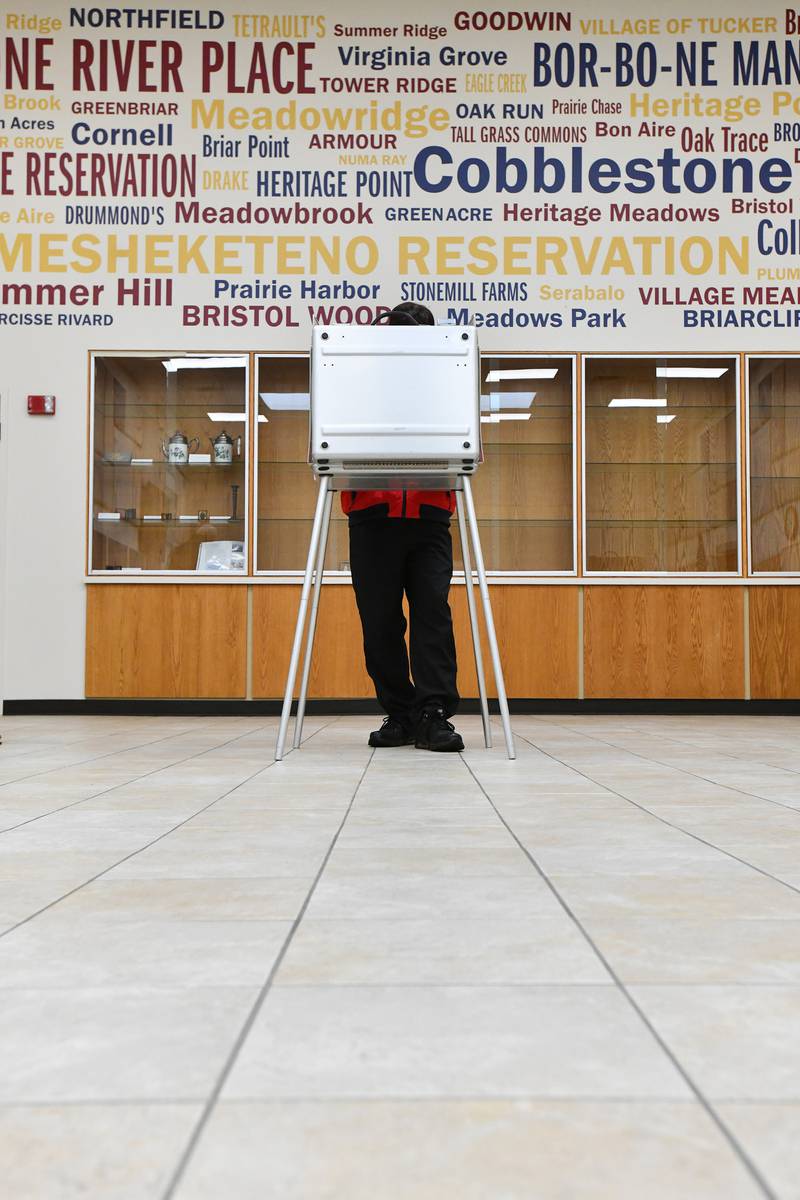 A voter casts their ballot at Bourbonnais Municipal Building in Nov. 2022.