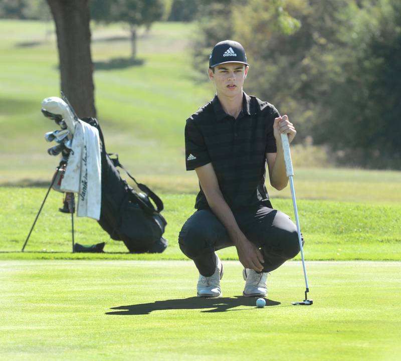 Riverdale's Aidan Dorathy contemplates a putt at the 1A Lanark Regional at Lake Carroll Golf Course on Wednesday, Oct. 2, 2024. Dorathy shot a 71 to lead the Rams to the regional team title.