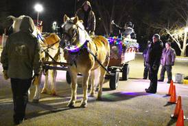 Wagon rides carry visitors through Rock Falls’ Centennial Park