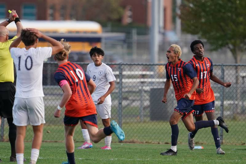 Oswego’s Noe Parra (15) reacts after scoring a goal against Oswego East during a soccer match at Oswego High School on Tuesday, Oct. 1, 2024.