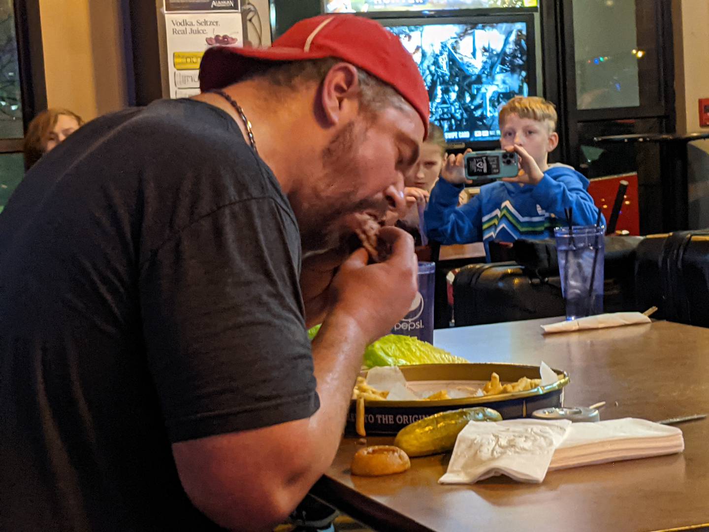 Those at Roadhouse 47 in Yorkville Jan. 26 cheered on professional eater and YouTube star Randy Santel as he took on the Big Hoss Challenge.