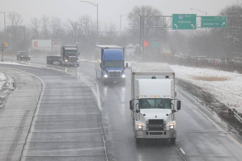A mix of rain and snow makes for a messy commute on westbound I-80 in Joliet on Wednesday January 25th, 2023.