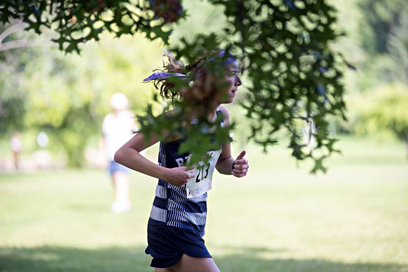 Emily Downing of Cambridge takes the win Tuesday, Aug. 23, 2022 in the Rock Falls Rocket Run at Centennial Park.