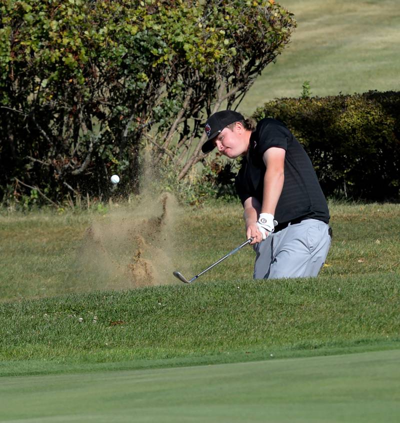Fulton's Zach Winkel hits out of a sand trap and on to the green at the 1A Lanark Regional at Lake Carroll Golf Course on Wednesday, Oct. 2, 2024.