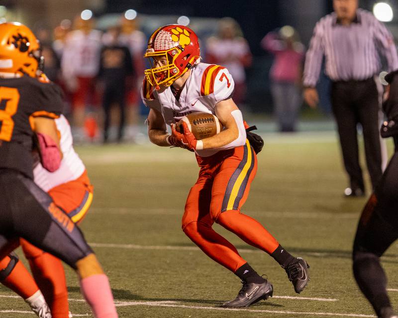 Batavia's Charlie Rosengren runs the ball against Wheaton Warrenville South on Friday, Oct. 24,2025 in Wheaton.