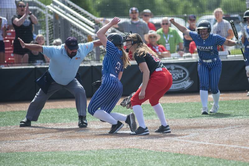 Newark’s Ryan Williams scores the tying run on a wild pitch late in the game against Forreston Saturday, June 4, 2022 during the IHSA Class 1A softball state third place game.