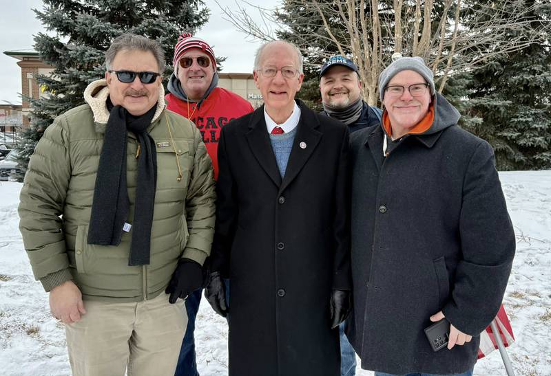 About 200 people protested the latest ICE killing in Minnesota on Randall Road in South Elgin Sunday, Jan. 25, 2026. 

Protestors include Kane County Democrats Chairman Mark Guethle, far left, U.S. Rep. Bill Foster, D-Naperville, center, Brian Pollock, candidate for Kane County Clerk in the March 17 primary, far right, Elgin Township Trustee Ed Hanson and Elgin Township Democratic Chairman Ed Rezeppa.