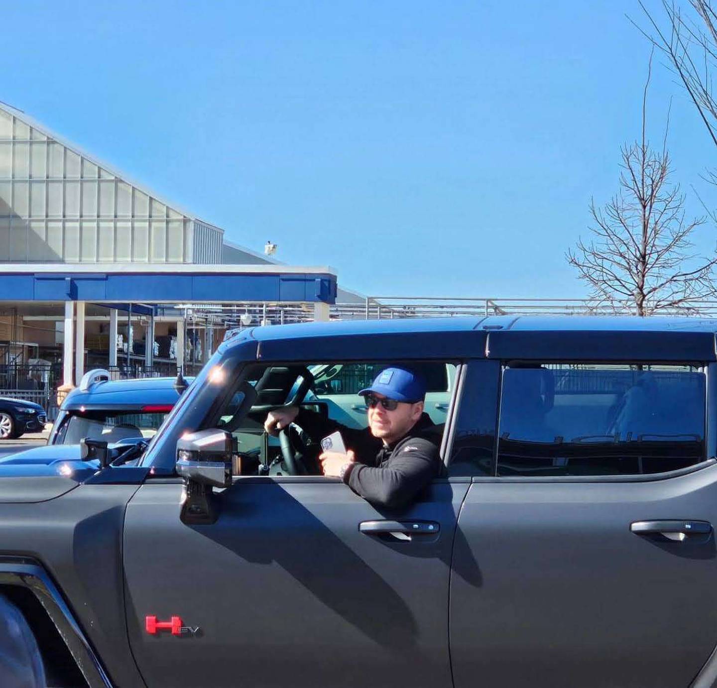 New Kid on The Block Donnie Wahlberg arrives at his St. Charles Wahlburger's restaurant to find a flash mob dancing to the group’s latest single.
