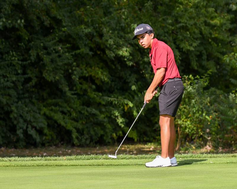 Sam Espinosa of Plainfield North watches his putt during the Plainfield Central regional on Wednesday Oct. 1, 2025, held at Wedgewood Golf Course in Plainfield.